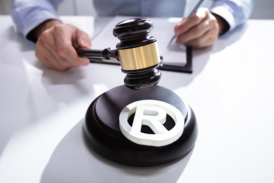 Trademark lawyer holding a gavel