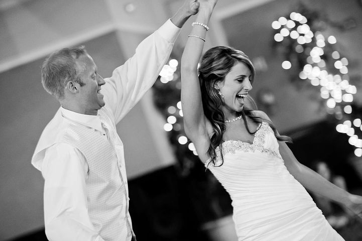 Bride and groom dancing in the reception